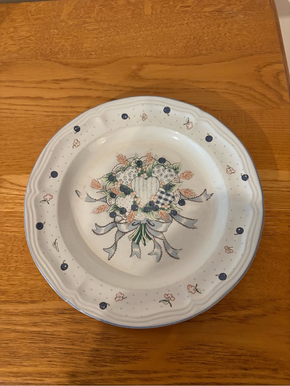 Set of 2 Tabletops Unlimited salad plate in the Blueberry Hearts pattern.